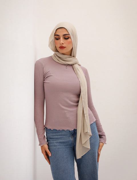 بلوزة مضلعة بأكمام طويلة 